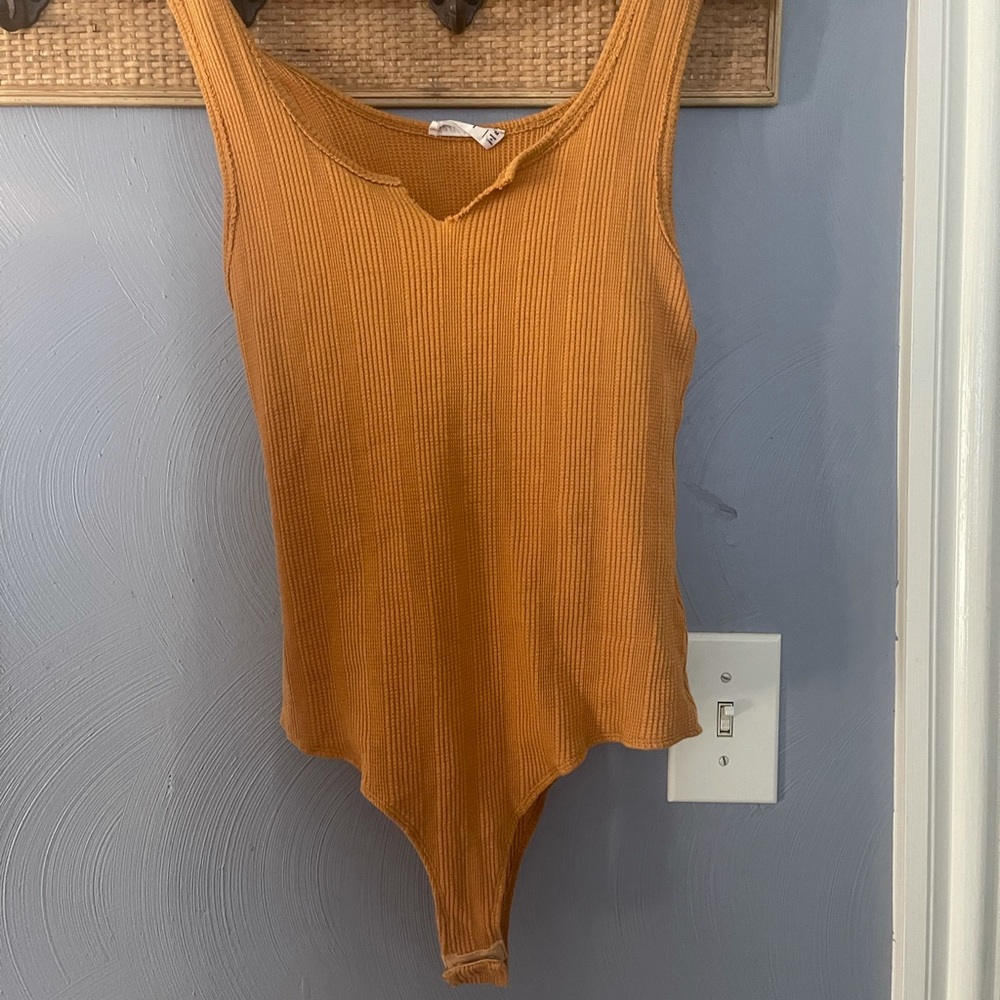Yellow body suit